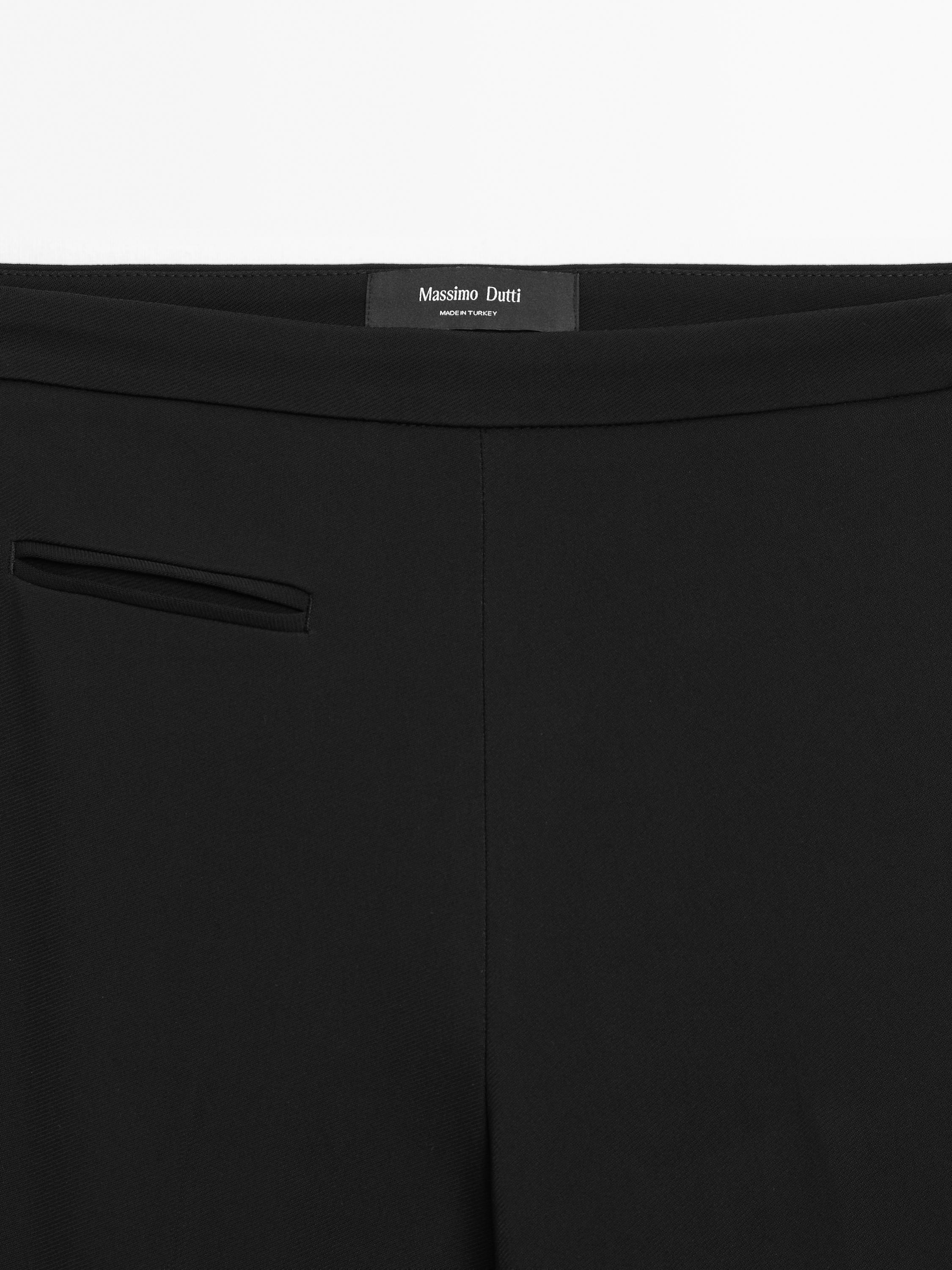 Flared trousers with pocket